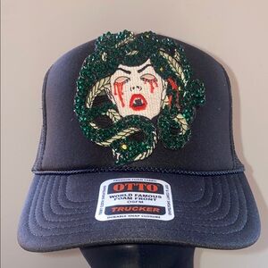 OTTO Black and Green MEDUSA HEAD TRUCKER/SNAPBACK with Structured Front..